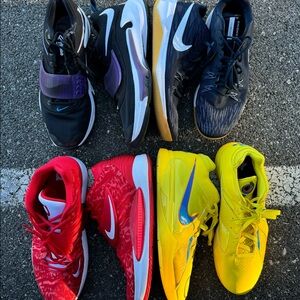 Four pairs of basketball sneakers for sale.